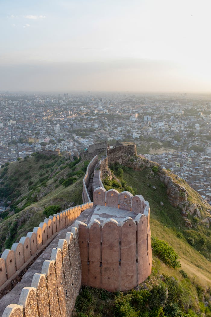 Scenic view of Nahargarh Fort wall over Jaipur city, showcasing historic architecture and landscape.